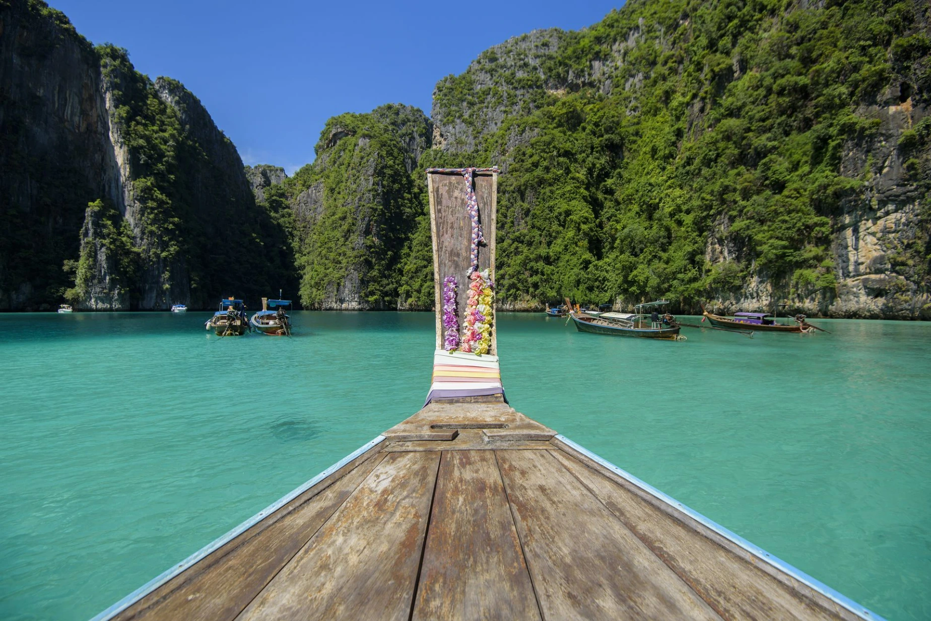 View of thai traditional longtail Boat over clear sea and sky in the sunny day, Phi Phi Islands, Thailand