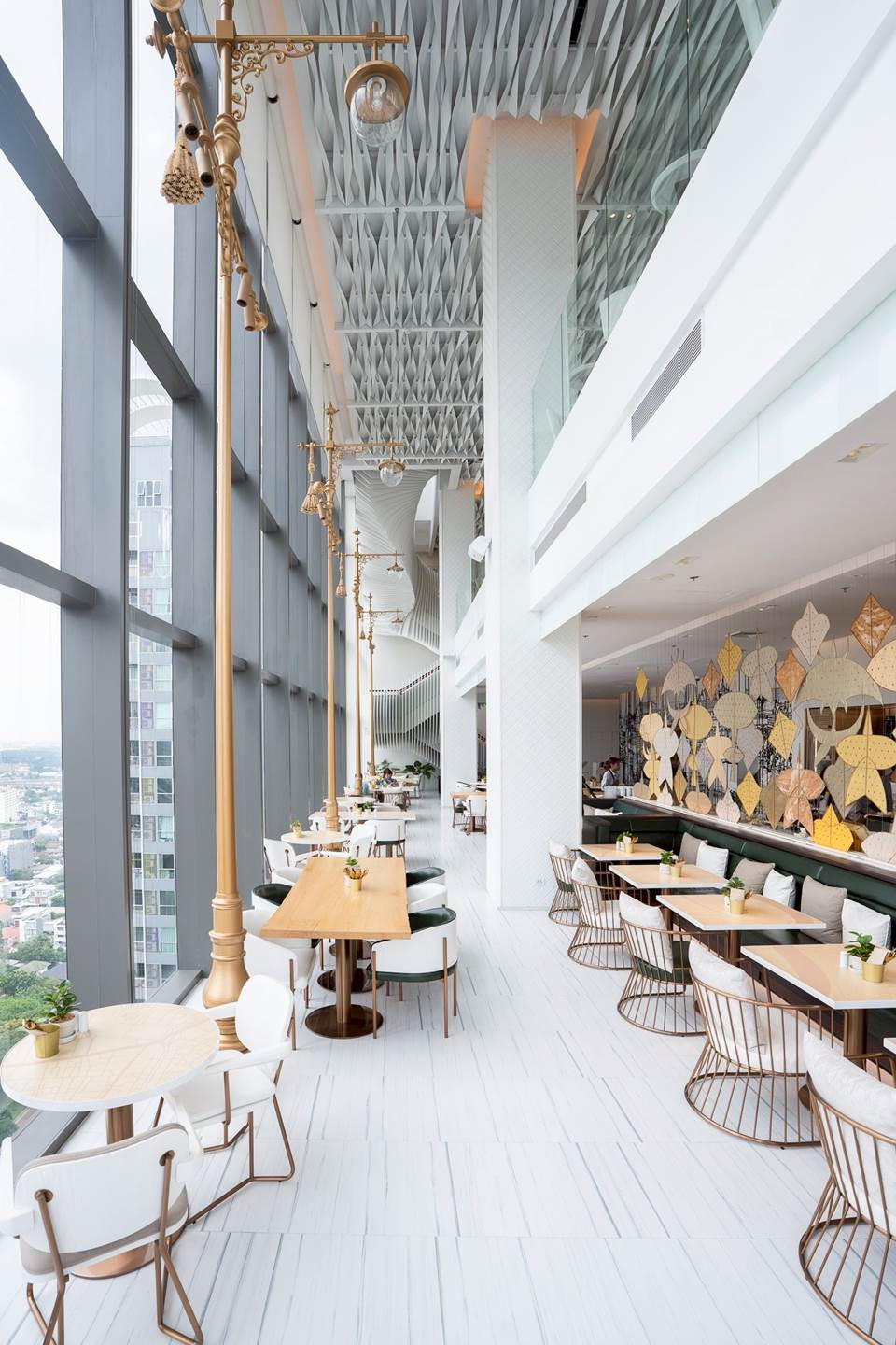 The Kites Eatery is adorned with abstract artwork of kites – a reference to the popular pastime of kite flying in state park Sanum Luang.